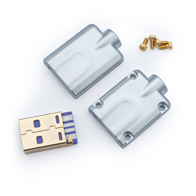 Disassembled USB A Housing CNC - V1 kit featuring a gold USB plug, two silver metallic casing parts, and four small gold screws neatly arranged on a white background.