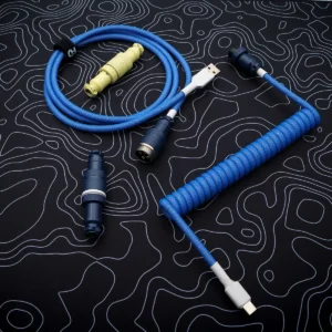 Custom blue keyboard cable featuring a coiled design, USB-C and aviator connectors, paracord material, and quality CNC metal housing for durability.