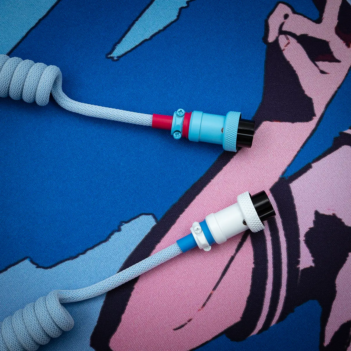 Custom GMK Oni keyboard cable featuring a textured white and blue paracord, with detachable aviator connectors and a stylish coil design.