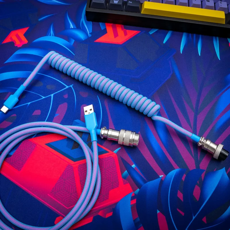 Colorful GMK Vaporwave keyboard cable with a coiled design and detachable USB-C and aviator connectors. Ideal for customizing your gaming setup.