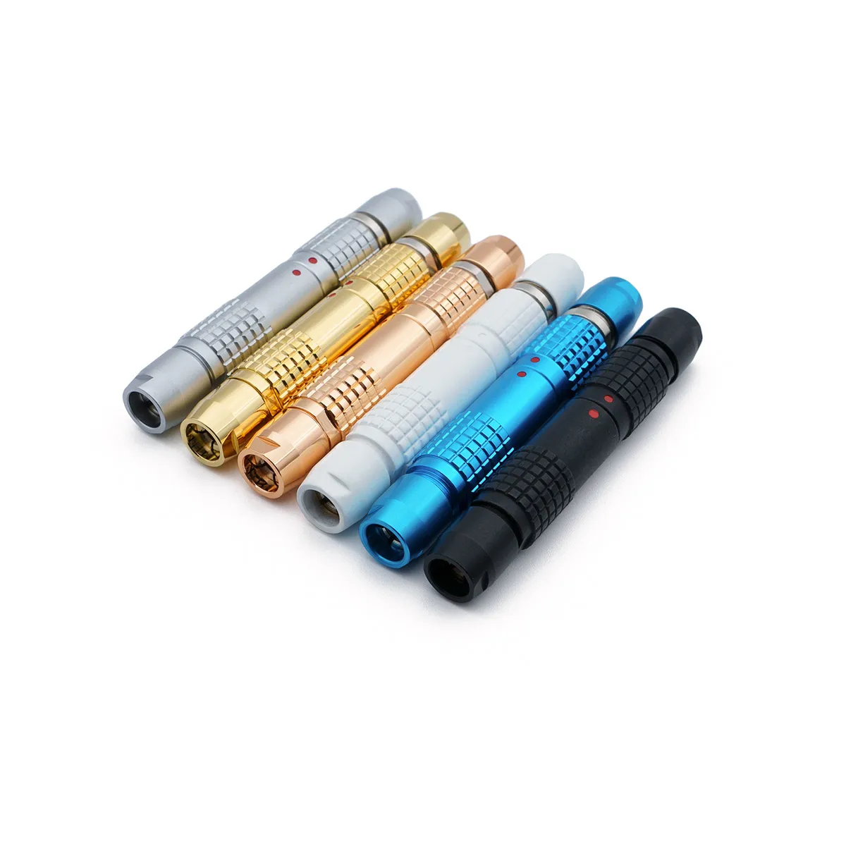Six double-ended, cylindrical lemo-like connectors in silver, gold, copper, white, blue, and black, arranged side by side on a white background, resembling 4 pins Lemo-Like Connectors.