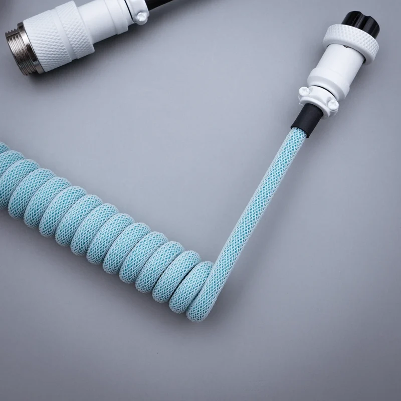 Custom GMK Delta Keyboard Cable featuring a blue coiled design, detachable connectors, and CNC metal housing for durability and style.