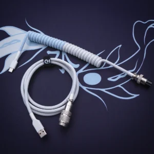 Custom keyboard cable featuring a coiled design in a soft blue and gray color scheme. Includes USB-C and aviator connectors with durable braiding and quality finish.