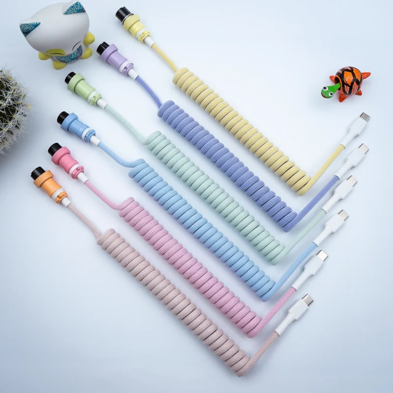 Vibrant PBT Milkshake Keyboard Cables in various pastel colors feature smooth coils. Includes detachable connectors for USB-C and micro-USB, enhancing versatility.