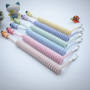 Colorful PBT milkshake keyboard cables with coiled design and smooth straight sections. Features USB-C connectors in various pastel colors with detachable plugs.