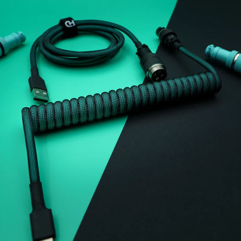 Custom GMK Hammerhead keyboard cable featuring a coiled paracord design, USB-C and aviator connectors, with premium braiding for durability.