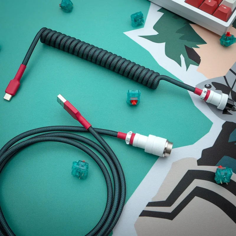 Custom spiral keyboard cable featuring a coiled portion in sleek black paracord, USB-C and detachable aviator connectors for versatility.