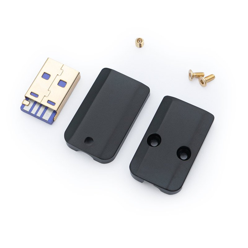 Disassembled USB device featuring a USB A connector, two black USB A Housing CNC - V2 casing pieces, and three small screws on a white background.